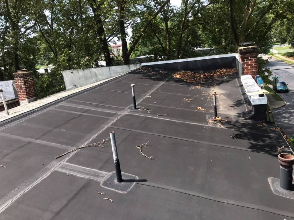 Initial roof inspection of an aged EPDM flat roof