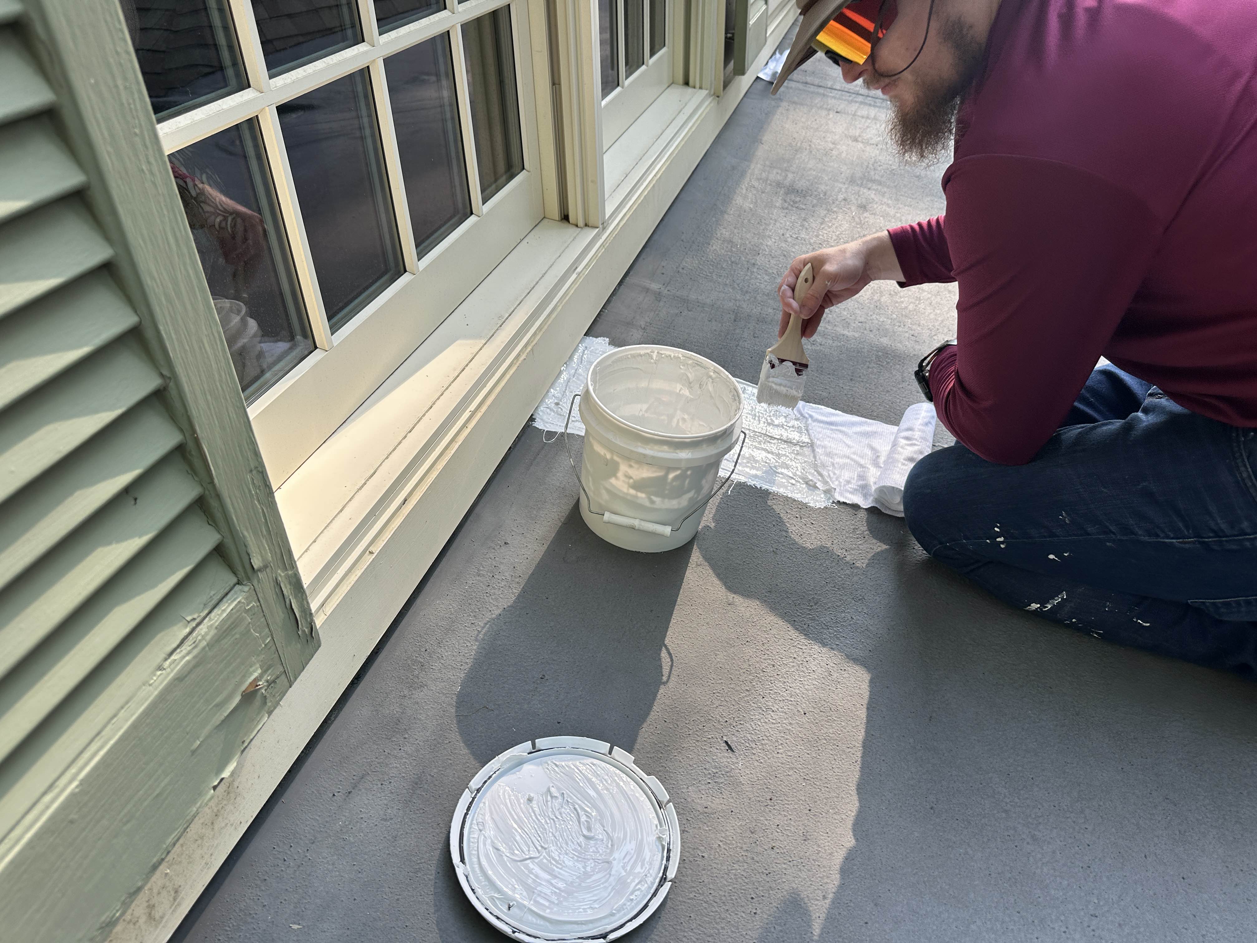 Sealing the flashing where a flat roof meets a wall
