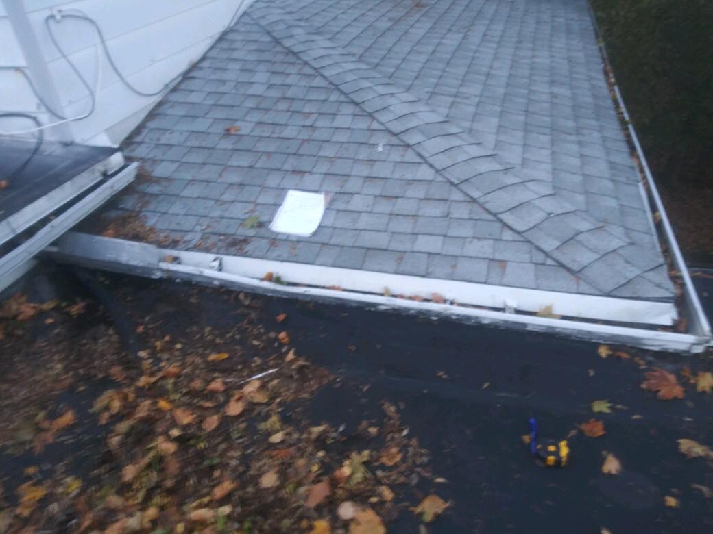 Water damage on a flat roof where a leak has worked through the membrane